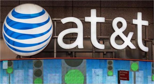 AT&T total revenue down 13% reflecting divested TV biz